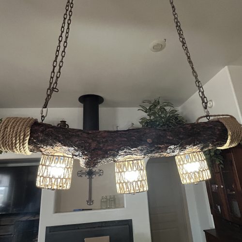 Rustic Log Chandelier – Handcrafted Elegance with Warm Glow